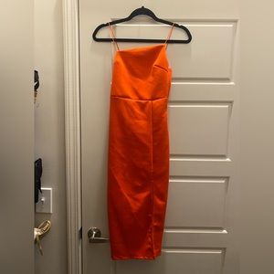 Orange tight dress with slit